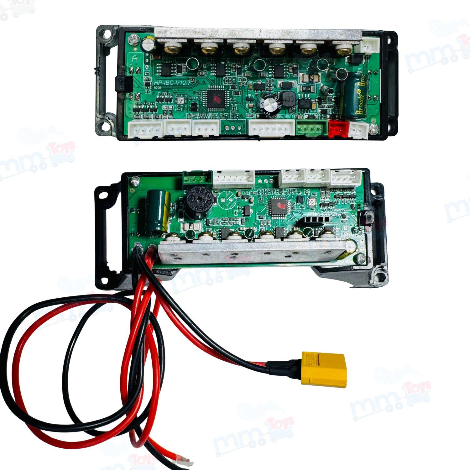 Two electronic circuit boards with wiring on a white background