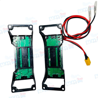 Two electronic modules with green circuit boards and black frames on a white background.