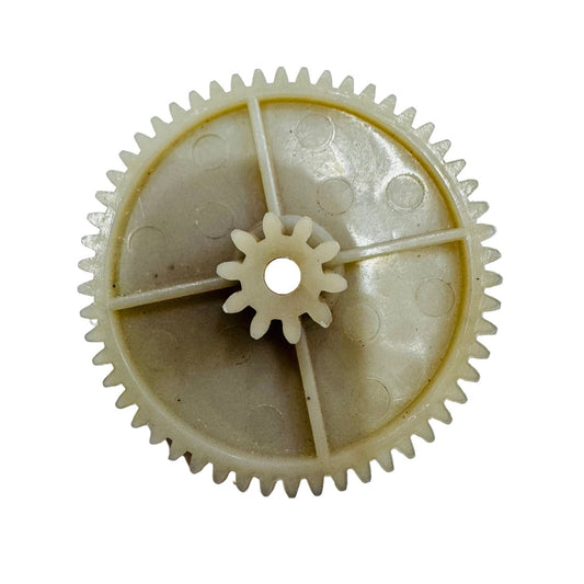 White plastic gear on a white background